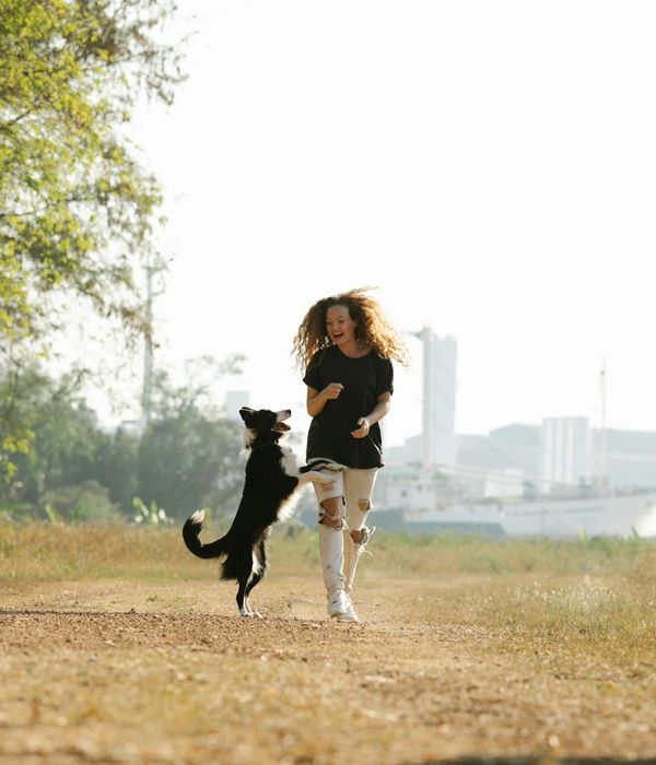 Woman feeling energetic and happy during an outdoor exercise.